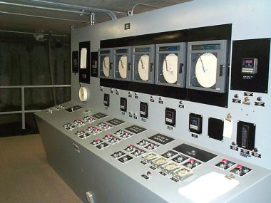 An old-style control roon. Note the paper charts and analogue instruments